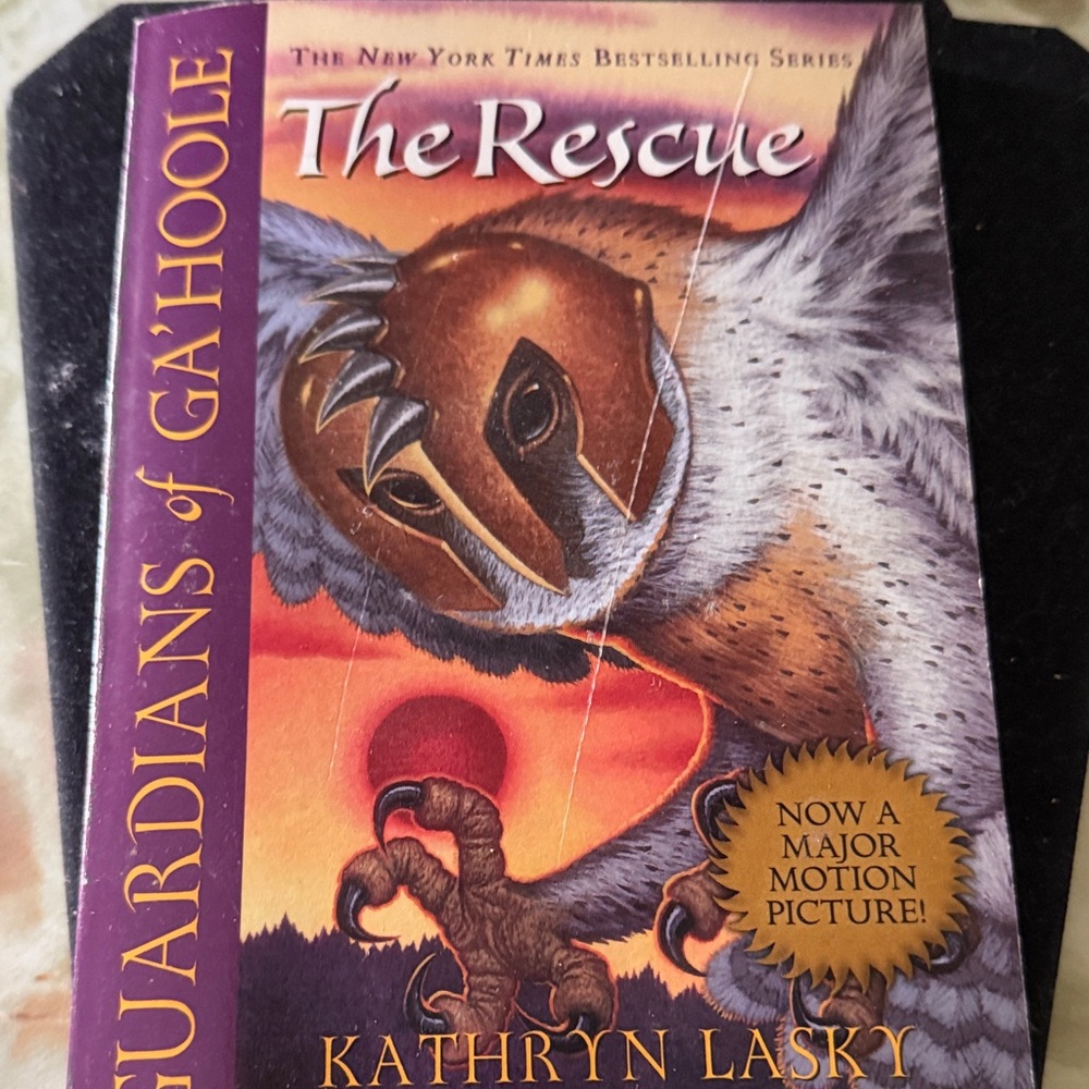 Scholastic The Rescue Book - Purple and Orange Cover